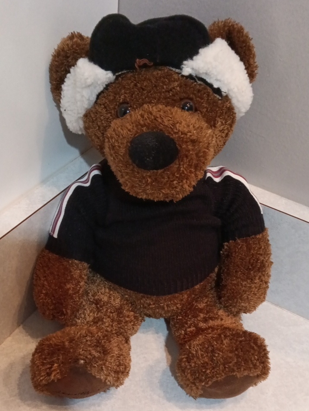 Eddie Bauer Brown Plush Bear Footpad with Black Embroidered Logo